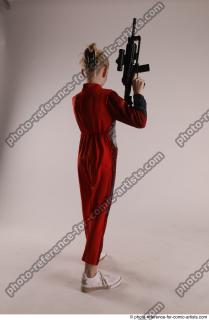 DENISA WITH TWO GUNS